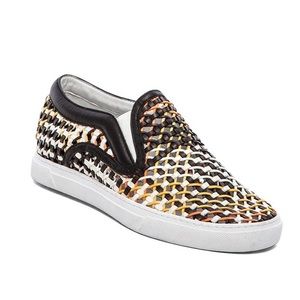 Woven leather upper with rubber sole. Slip-on styling.